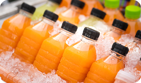 Orange Juice Bottles On Ice